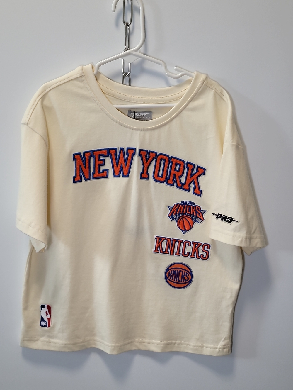 NBA New York Knicks Cream Tee with Orange & Blue Logos